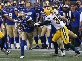 Winnipeg Blue Bombers KR Ryan Lankford runs back a kick against the Edmonton Eskimos during CFL action in Winnipeg on Thurs., June 14, 2018. Kevin King/Winnipeg Sun/Postmedia Network