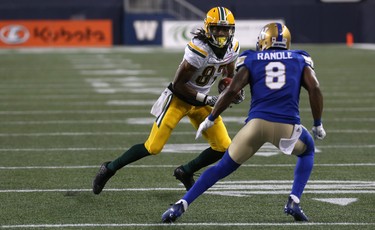 Edmonton Eskimos WR Derel Walker (left) sizes up Winnipeg Blue Bombers DB Chris Randle during CFL action in Winnipeg on Thurs., June 14, 2018. Kevin King/Winnipeg Sun/Postmedia Network