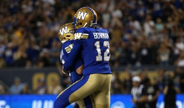 Winnipeg Blue Bombers receivers Weston Dressler (left) and Adarius Bowman celebrate a Dressler touchdown against the Edmonton Eskimos during CFL action in Winnipeg on Thurs., June 14, 2018. Kevin King/Winnipeg Sun/Postmedia Network