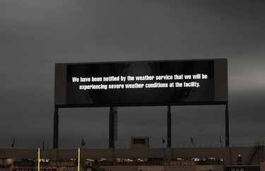 The scoreboard warns of severe weather, forcing a delay in CFL action between the Winnipeg Blue Bombers and Edmonton Eskimos in Winnipeg on Thurs., June 14, 2018. Kevin King/Winnipeg Sun/Postmedia Network