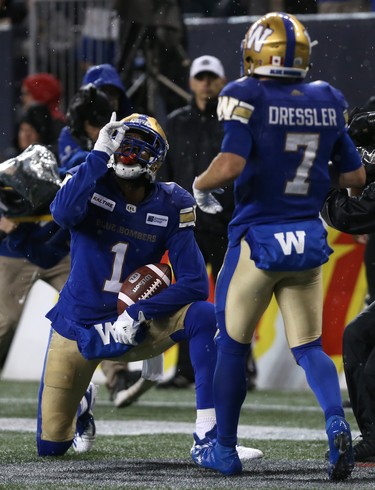 Winnipeg Blue Bombers WR Darvin Adams celebrates his touchdown catch against the Edmonton Eskimos during CFL action in Winnipeg with Weston Dressler on Thurs., June 14, 2018. Kevin King/Winnipeg Sun/Postmedia Network