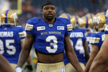 Winnipeg Blue Bombers DB Kevin Fogg slaps hands with teammates during player introductions prior to facing the Edmonton Eskimos in CFL action in Winnipeg on Thurs., June 14, 2018. Kevin King/Winnipeg Sun/Postmedia Network