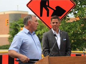 Mayor Brian Bowman (right) at a press conference last month to announce the start of Winnipeg's largest construction season in history last month. While the city is spending a record $116 million on street renewal, it is nowhere near what is needed to upgrade our streets and roads.