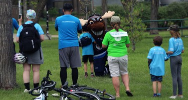 Winnipeg Jets mascot Mick E. Moose makes friends at the Ride Don't Hide event in support of mental health at Vimy Ridge Park in Winnipeg on Sun., June 24, 2018. Kevin King/Winnipeg Sun/Postmedia Network
