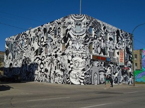 A massive mural, En Massi X, covering the New West Hotel in Winnipeg was created to improve the city’s view of the North End.