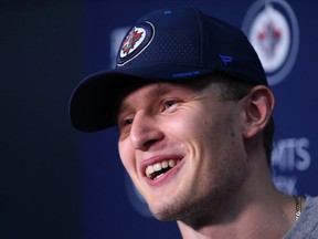 Kristian Vesalainen laughs while answering a question about Patrik Laine's beard during Winnipeg Jets development camp at Bell MTS Iceplex on Wed., June 27, 2018. Kevin King/Winnipeg Sun/Postmedia Network