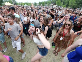 Winnipeg Folk Festival goers dance while listening to performers Chali 2na & the House of Vibe, Desi Sub Cultures and DJ Shub at  the 44th annual Winnipeg Folk Festival at Birds Hill Provincial Park located just outside Winnipeg, Man., on Saturday, July 8, 2017. (Brook Jones/Selkirk Journal/Postmedia Network)