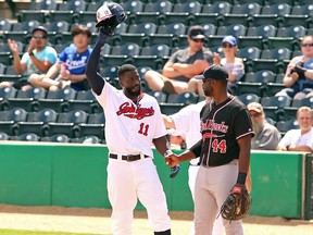 Winnipeg Goldeyes outfielder Reggie Abercrombie acknowledges the crowd after singling to left-centre in the third inning against the Fargo-Moorhead RedHawks on Sunday, for his 802nd hit in the American Association, a new league record.