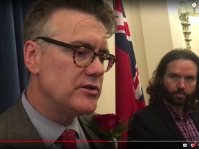 Screenshot of Dougald Lamont being sworn in at the Manitoba legislature on Friday, July 27, 2018.