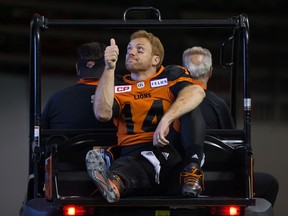 Quarterback Travis Lulay, who gives the thumbs up while being driven to the B.C. Lions' locker-room with an injury last season, might be the CFL team's starter on Saturday at B.C. Place Stadium against the Winnipeg Blue Bombers.