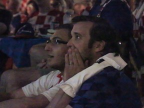 During the final game of the 2018 FIFA World Cup between France and Croatia, Croatia fans watch from the basement of the St. Nicholas Tavelich Croatian Catholic Church in Winnipeg on Sunday.