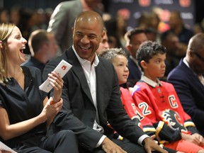 NHL great Jarome Iginla and family retires a Calgary Flames at the Scotiabank Saddledome in Calgary on Monday July 30, 2018. Darren Makowichuk/Postmedia