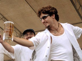 0623 na creston Justin Trudeau gets inducted into the Order of Saquatch Hunters at the Columbia Brewery's Kokanee Summit Festival held in Creston, B.C. on Sunday August 6, 2000. Trudeau was on hand for the festivities to raise awareness of the Kokanee Glacier Alpine Campaign - a memorial to his late brother Michel. CNW release - 0622 na creston CREDIT: CNW/Handout For creston valley advance story