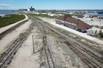 An aerial view of the rail line and Via station is shown in Churchill, Manitoba, Wednesday, July 4, 2018. The closure of the port and the rail line has resulted in economic hardship in the community. THE CANADIAN PRESS/John Woods