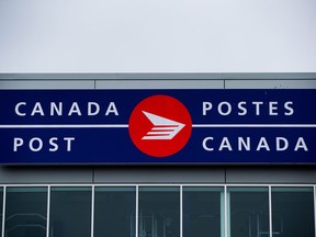 The Canada Post logo is seen on the outside the company's Pacific Processing Centre, in Richmond, B.C., on June 1, 2017.