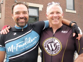 Kevin McFadden (left) and Pat O'Connor of Ducks Unlimited after their 221 km cycle from Winnipeg to Kenora in an effort to raise money on Friday, July 20. Ryan Stelter/Daily Miner and News