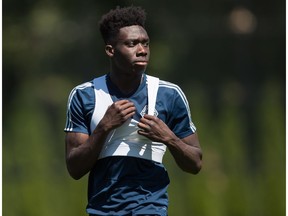 Vancouver Whitecaps midfielder Alphonso Davies leaves the field after MLS soccer team practice in Vancouver on Monday, July 23, 2018.