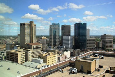 The view of WinnipegÕs skyline surrounding Portage Avenue and Main Street from the top floor of the 17-storey True North Square office building in Winnipeg on July 23, 2018.
Danton Unger/Winnipeg Sun