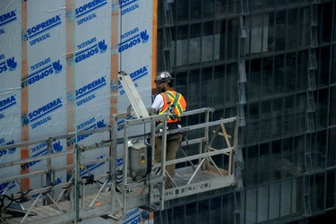 Construction crews work on the nearly completed 17-storey True North Square office building in Winnipeg on July 23, 2018.
Danton Unger/Winnipeg Sun
