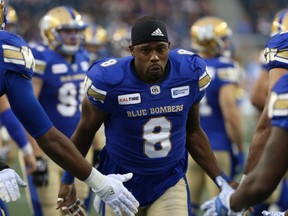 Winnipeg Blue Bombers DB Chris Randle slaps hands with teammates during player introductions prior to facing the Edmonton Eskimos in CFL action in Winnipeg on Thurs., June 14, 2018. Kevin King/Winnipeg Sun/Postmedia Network