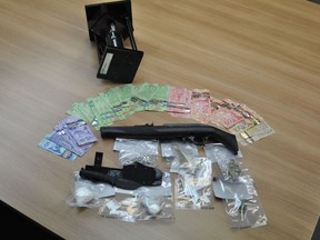 On Friday, at around 5 a.m., officers from the Dauphin RCMP, with assistance from the RCMP Emergency Response Team, executed a search warrant at a home located on Jackson Street in the City of Dauphin. The search recovered 80 grams of cocaine, a sawed-off firearm, cash and various items of drug paraphernalia.