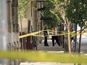 Winnipeg Police officers investigate the scene of a stabbing in the 100 block of Princess Avenue on Saturday July 7, 2018. At approximately 3:41 a.m., emergency services responded to the area outside of a nightclub in the 100 block of Princess Street for a report of a male that had been stabbed. When they arrived, officers located three males suffering from stab wound injuries. One male was taken to hospital in critical condition. The other two were transported in unstable and stable conditions.