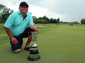 Justin McDonald poses with the trophy after winning the provincial men's amateur championship at Glendale Golf and Country Club in Winnipeg on Thurs., July 19, 2018. Kevin King/Winnipeg Sun/Postmedia Network