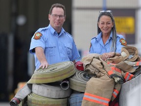 Shelley Brown (right) and Shawn Gobeil organize the recycling of used firefighting equipment for the Winnipeg Fire Paramedic Service.
