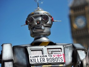 (FILES) -- A file photo taken on April 23, 2013 shows a mock "killer robot" pictured in central London during the launching of the Campaign to Stop "Killer Robots," which calls for the ban of lethal robot weapons that would be able to select and attack targets without any human intervention. AFP PHOTO/CARL COURTCARL COURT/AFP/Getty Images