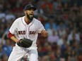 David Price of the Boston Red Sox reacts after being hit by a ball off the bat of Austin Dean of the Miami Marlins in the third inning at Fenway Park on August 29, 2018 in Boston, Mass. (Jim Rogash/Getty Images)