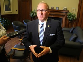 Finance Minister Scott Fielding speaks with media on Wednesday, Aug. 15, 2018 about the province's decision to exempt recreational cannabis sales from the provincial sales tax. Fielding says that should help the province compete with, and ultimately undermine, the black market for the drug. (JOYANNE PURSAGA/Winnipeg Sun/Postmedia Network)