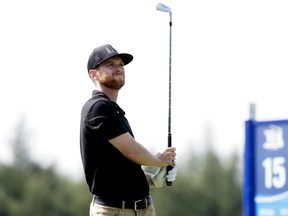 Tyler McCumber tees off on the 15th hole during the final round of the Syncrude Oil Country Championship at the Edmonton Petroleum Golf and Country Club, Sunday Aug. 5, 2018. Photo by David Bloom