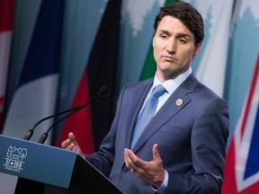 In this file photo taken on June 9, 2018, Canadian Prime Minister Justin Trudeau addresses a press conference at the conclusion of the G7 summit in La Malbaie, Quebec. - Trudeau said on August 8, 2018, his government will not stop calling out human rights abuses, after its criticisms of Saudi Arabia triggered a diplomatic row.
