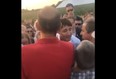 Prime Minister Justin Trudeau encounters a woman who had been heckling him at an event Sabrevois, Que. on Aug. 16, 2018.