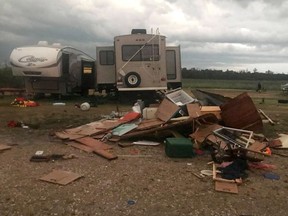 Debris is strewn about after a tornado at Margaret Bruce Beach, east of Alonsa, Man., on Friday, Aug.3, 2018. Residents are frustrated that they didn't receive emergency alerts on their cell phones before a tornado tore through a small Manitoba community on Friday.