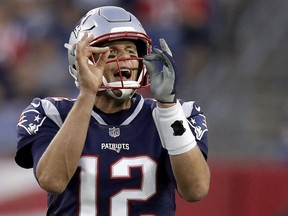 New England Patriots quarterback Tom Brady calls signals at the line of scrimmage during the first half of a preseason NFL football game against the Philadelphia Eagles, Thursday, Aug. 16, 2018, in Foxborough, Mass.