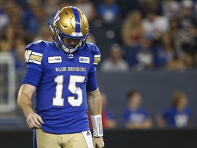 Winnipeg Blue Bombers quarterback Matt Nichols (15) walks off the field against the Ottawa Redblacks during the second half of CFL action in Winnipeg Friday, August 17, 2018. THE CANADIAN PRESS/John Woods ORG XMIT: JGW118