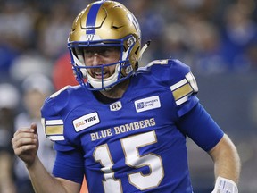 Winnipeg Blue Bombers quarterback Matt Nichols (15) reacts after getting injured during the second half of CFL action against the Ottawa Redblacks in Winnipeg Friday.