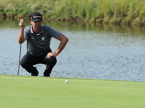 Michael Gligic lines up a putt during the final round of the Players Cup at Southwood Golf and Country Club in St. Norbert on Sunday. (Kevin King/Winnipeg Sun)