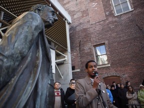A statue of Canada's first prime minister has been removed from the grounds outside Victoria City Hall, days after the city council voted to remove it. The statue of Sir John A. Macdonald overlooks the Imam at Masjid Al-Iman, Ismail Mohamed Nur, speaks during a vigil to honour the victims of a shooting at a Quebec City mosque, in Victoria on Tuesday, January 31, 2017. THE CANADIAN PRESS/Chad Hipolito ORG XMIT: CPT104