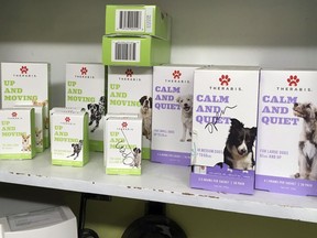 Marijuana products for dogs are lined up on a shelf in the Bend Veterinary Clinic in Bend, Ore., in a Sept, 29, 2017 file photo.