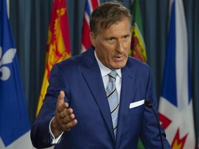 Maxime Bernier responds to questions after announcing he will leave the Conservative party during a news conference in Ottawa, Thursday Aug. 23, 2018.