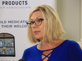Sustainable Development Minister Rochelle Squires says a reversal of federal green funding will jeopardize 15 carbon-reduction projects deemed that have been deemed joint provincial-federal priorities.