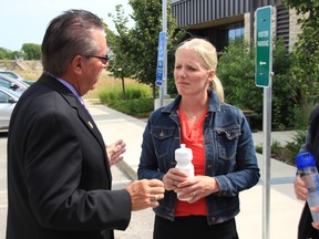 Selkirk Mayor Larry Johannson (Left) greets Minister of Environment and Climate Change, Catherine McKenna (Right) during her visit to Selkirk on August 2, 2018.