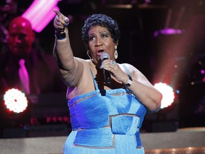 FILE - This Jan. 14, 2012 file photo, shows singer Aretha Franklin performing during the BET Honors at the Warner Theatre in Washington.  Franklin died Thursday, Aug. 16, 2018 at her home in Detroit.  She was 76.