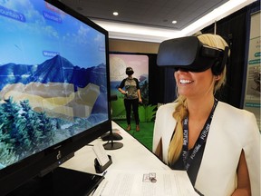 FILE PHOTO: Lindsay Brodie in action at the Extraordinary Future Conference as five of the top VR/AR companies in Vancouver gather to demonstrate their technology in a 'virtual reality village' to showcase the diverse application of this technology in Vancouver, BC., September 20, 2017.