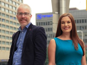 Adam Dooley (left) and Alyson Shane (right), spokespersons with the Coalition for Portage & Main, announces the launch of a GoFundMe campaign to support a pedestrian friendly intersection at Portage Avenue and Main Street in Winnipeg on August 16, 2018. Danton Unger/Postmedia