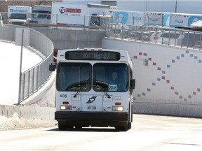 A Winnipeg Transit bus approaches the Osborne Rapid Transit station.