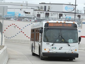 A Winnipeg Transit bus approaches the Osborne Street rapid transit station.
