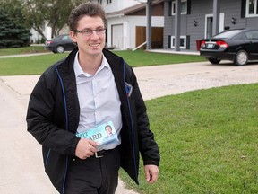 St. Boniface councillor Matt Allard campaigns in his ward during the 2014 civic election. Allard is one of four city councillors still without any competition in the upcoming election.